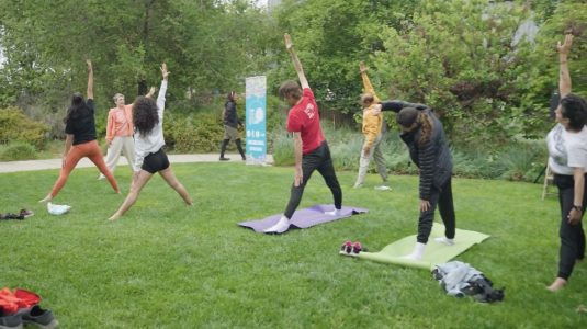 A photo of yoga after a bike event